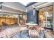 Inviting covered patio with modern design, seating, and outdoor decor at 1392 S Edison Way, Denver, CO 80222