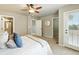 Spacious bedroom with ensuite bath and closet, and a private patio at 1100 Rockhurst Dr # A, Highlands Ranch, CO 80129