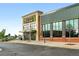 Exterior of Natural Grocers with a view of the entrance, parking area and surrounding trees at 1100 Rockhurst Dr # A, Highlands Ranch, CO 80129