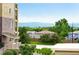 Scenic view of the community with lush greenery and mountain views in the distance at 1100 Rockhurst Dr # A, Highlands Ranch, CO 80129
