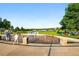 Children play in fountain at park with lush green landscape, and people gathering at 1100 Rockhurst Dr # A, Highlands Ranch, CO 80129