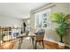 Bright landing area with desk space, natural light, and a view of the neighborhood at 1100 Rockhurst Dr # A, Highlands Ranch, CO 80129