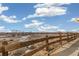 Open space with wooden fence offering a peaceful view at 16058 E Geddes Ln # 26, Aurora, CO 80016