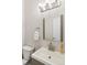 Updated bathroom features a vanity and toilet at 16058 E Geddes Ln # 26, Aurora, CO 80016