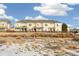 Townhome community with a shared green space at 16058 E Geddes Ln # 26, Aurora, CO 80016