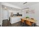 Modern kitchen with stainless steel appliances and a breakfast bar at 16058 E Geddes Ln # 26, Aurora, CO 80016