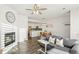 Bright and spacious living room with fireplace and open floor plan at 16058 E Geddes Ln # 26, Aurora, CO 80016