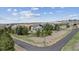 Aerial view of a home surrounded by lush trees, offering privacy and seclusion in a serene setting at 20363 E Top T Ranch Pl, Parker, CO 80134