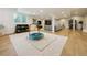 Finished basement with light wood floors, a comfortable couch, and a play area for children at 20363 E Top T Ranch Pl, Parker, CO 80134