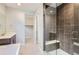 Modern bathroom features a glass-enclosed shower with bench and adjacent vanity at 3109 Newfound Lake Rd, Berthoud, CO 80513