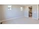 A bright bedroom leads into a full bathroom with tub, and a neutral carpet at 3109 Newfound Lake Rd, Berthoud, CO 80513