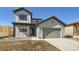 Charming two-story home with modern design elements and an attached two-car garage at 3109 Newfound Lake Rd, Berthoud, CO 80513