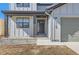 Inviting front entrance with modern design, stylish door, and well-manicured landscaping at 3109 Newfound Lake Rd, Berthoud, CO 80513