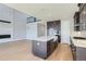 Modern kitchen features dark cabinets, stainless steel appliances, and a center island at 3109 Newfound Lake Rd, Berthoud, CO 80513