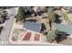 Aerial view of the property shows a large lot and mature trees at 391 Burgess Dr, Castle Rock, CO 80104