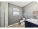 Updated bathroom features a shower and marble vanity at 391 Burgess Dr, Castle Rock, CO 80104