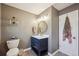 Bright bathroom with vanity and modern lighting at 391 Burgess Dr, Castle Rock, CO 80104