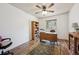 Office with a desk, bookcase, and hardwood floors at 391 Burgess Dr, Castle Rock, CO 80104