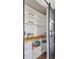 Walk-in pantry with sliding barn doors at 391 Burgess Dr, Castle Rock, CO 80104
