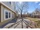 Lovely backyard featuring an outdoor patio, luscious green grass, and the exterior of the home at 10157 W Fremont Pl, Littleton, CO 80127
