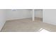 Finished basement with carpet, recessed lighting, and a small window at 10157 W Fremont Pl, Littleton, CO 80127