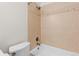 Bathroom with a tiled shower and tub at 10157 W Fremont Pl, Littleton, CO 80127