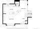 An open-concept floor plan features a kitchen, dining area, living room, and foyer at 10157 W Fremont Pl, Littleton, CO 80127