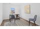 Office space with a desk, chairs, and a large window at 10157 W Fremont Pl, Littleton, CO 80127