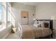 Inviting bedroom featuring soft light, large windows, and neutral tones for a relaxing atmosphere at 5455 Landmark Pl # 1106, Greenwood Village, CO 80111