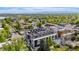 Wide aerial shot showcasing the neighborhood and the modern condos with rooftop decks at 5125 W 29Th Ave # 5, Denver, CO 80212