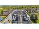 Aerial view of modern condos showing rooftop terraces and the surrounding neighborhood at 5125 W 29Th Ave # 5, Denver, CO 80212