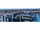 Stunning view of modern rooftop patios and building, complete with lounge furniture and mountain views at 5125 W 29Th Ave # 5, Denver, CO 80212