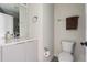 Clean bathroom with a modern vanity, toilet, and towel rack at 5125 W 29Th Ave # 5, Denver, CO 80212