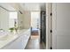 Luxurious bathroom features a double vanity and glass enclosed shower, creating a spa-like experience at 5125 W 29Th Ave # 5, Denver, CO 80212