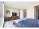 Comfortable bedroom features natural light, hardwood floors, and ample space, a peaceful retreat at 5125 W 29Th Ave # 5, Denver, CO 80212