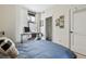Bright bedroom area with a large window and light-colored walls at 5125 W 29Th Ave # 5, Denver, CO 80212