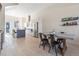 Open-concept kitchen and dining area featuring sleek countertops, stainless steel appliances, and modern finishes at 5125 W 29Th Ave # 5, Denver, CO 80212