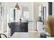 Modern kitchen with an island bar, sleek countertops, and stainless steel appliances at 5125 W 29Th Ave # 5, Denver, CO 80212