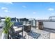Inviting rooftop deck with stylish furniture and fire pit, perfect for enjoying outdoor living space at 5125 W 29Th Ave # 5, Denver, CO 80212