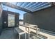 Stylish rooftop deck features modern pergola, seating, and sleek design, perfect for entertaining outdoors at 5125 W 29Th Ave # 5, Denver, CO 80212