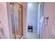 Clean bathroom with a glass-enclosed shower, tile surround, and modern fixtures at 10550 Ashfield St, Highlands Ranch, CO 80126