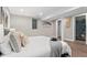 Neutral bedroom features lots of natural light and stylish decor at 2391 S Quitman St, Denver, CO 80219