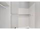A closet offers shelving and hanging rods for organized storage at 2391 S Quitman St, Denver, CO 80219