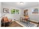 Bright home office featuring a large window and a modern desk at 2391 S Quitman St, Denver, CO 80219
