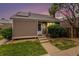 Charming home featuring a well-maintained front yard and a welcoming entrance with steps leading to the front door at 3852 S Genoa Ct # B, Aurora, CO 80013