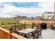 Relaxing backyard patio offers ample seating and a grill, perfect for outdoor gatherings at 870 Mosquito Ct, Elizabeth, CO 80107