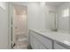 Well-lit bathroom with a granite vanity and access to a bathtub at 870 Mosquito Ct, Elizabeth, CO 80107