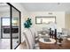 Elegant dining room with seating for eight, stylish decor, and easy access to the outdoor spa at 6843 Fairview Dr, Boulder, CO 80303