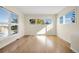 Bright living room with large windows and hardwood flooring at 6843 Fairview Dr, Boulder, CO 80303