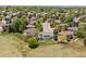 Beautiful aerial shot of a neighborhood showcasing well-maintained homes and green spaces at 8806 Tuscany Ln, Highlands Ranch, CO 80130